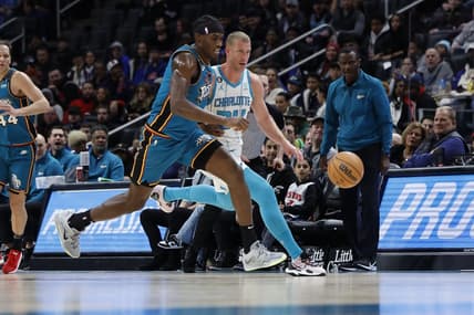 Feb 3, 2023; Detroit, Michigan, USA;  Detroit Pistons center Jalen Duren (0) and Charlotte Hornets center Mason Plumlee (24) go for the ball in the first half at Little Caesars Arena. Mandatory Credit: Rick Osentoski-USA TODAY Sports
