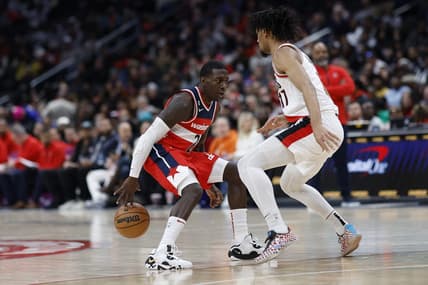 Feb 3, 2023; Washington, District of Columbia, USA; Washington Wizards guard Kendrick Nunn (20) dribbles the ball as Portland Trail Blazers guard Shaedon Sharpe (17) defends in the fourth quarter at Capital One Arena. Mandatory Credit: Geoff Burke-USA TODAY Sports