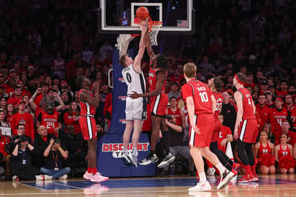 Feb 4, 2023; New York, New York, USA; Rutgers Scarlet Knights center Clifford Omoruyi (11) blocks a shot by Michigan State Spartans forward Jaxon Kohler (0) during the first half at Madison Square Garden. Mandatory Credit: Vincent Carchietta-USA TODAY Sports