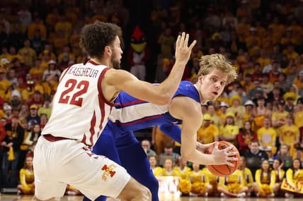 Feb 4, 2023; Ames, Iowa, USA; Iowa State Cyclones guard Gabe Kalscheur (22) defends Kansas Jayhawks guard Gradey Dick (4) during the first half at James H. Hilton Coliseum. Mandatory Credit: Reese Strickland-USA TODAY Sports
