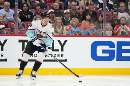 Feb 4, 2023; Sunrise, Florida, USA; Pacific Division forward Bo Horvat (14) of the New York Islanders skates with the puck against the Central Division during the first period of a semifinal game during the 2023 NHL All-Star Game at FLA Live Arena. Mandatory Credit: Jasen Vinlove-USA TODAY Sports