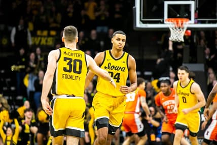Iowa forward Kris Murray (24) gets a high-five from guard Connor McCaffery (30) during a NCAA Big Ten Conference men's basketball game against Illinois, Saturday, Feb. 4, 2023, at Carver-Hawkeye Arena in Iowa City, Iowa.

230204 Illinois Iowa Mbb 009 Jpg