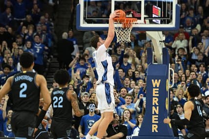 Feb 4, 2023; Omaha, Nebraska, USA; Creighton Bluejays center Ryan Kalkbrenner (11) dunks against the Villanova Wildcats in the first half at CHI Health Center Omaha. Mandatory Credit: Steven Branscombe-USA TODAY Sports