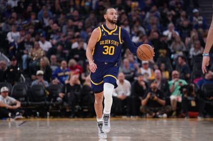 Feb 4, 2023; San Francisco, California, USA; Golden State Warriors guard Stephen Curry (30) dribbles the ball against the Dallas Mavericks in the third quarter at the Chase Center. Mandatory Credit: Cary Edmondson-USA TODAY Sports