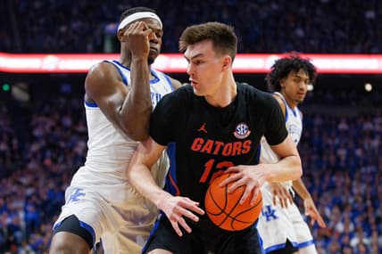 Feb 4, 2023; Lexington, Kentucky, USA; Florida Gators forward Colin Castleton (12) handles the ball against the Kentucky Wildcats during the first half at Rupp Arena at Central Bank Center. Mandatory Credit: Jordan Prather-USA TODAY Sports