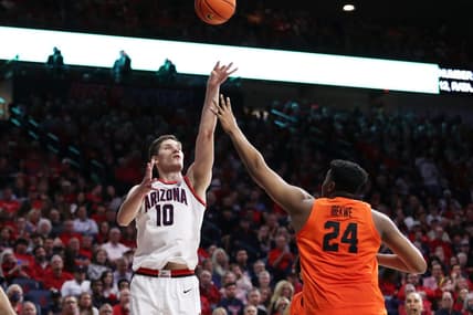 Feb 4, 2023; Tucson, Arizona, USA; Arizona Wildcats forward Azuolas Tubelis (10) makes a basket against Oregon State Beavers center KC Ibekwe (24) in the second half at McKale Center. Mandatory Credit: Zachary BonDurant-USA TODAY Sports