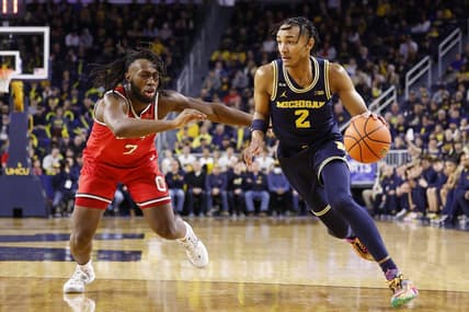 Feb 5, 2023; Ann Arbor, Michigan, USA; Michigan Wolverines guard Kobe Bufkin (2) dribbles on Ohio State Buckeyes guard Bruce Thornton (2) in the first half at Crisler Center. Mandatory Credit: Rick Osentoski-USA TODAY Sports