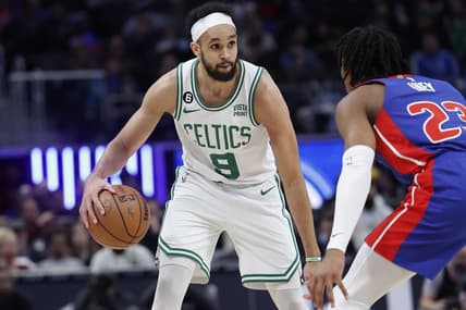 Feb 6, 2023; Detroit, Michigan, USA; Boston Celtics guard Derrick White (9) dribbles defended by Detroit Pistons guard Jaden Ivey (23) in the first half at Little Caesars Arena. Mandatory Credit: Rick Osentoski-USA TODAY Sports