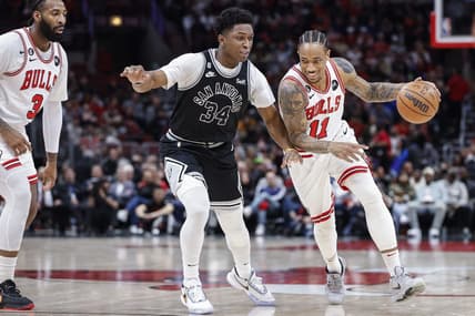 Feb 6, 2023; Chicago, Illinois, USA; Chicago Bulls forward DeMar DeRozan (11) drives to the basket against San Antonio Spurs forward Stanley Johnson (34) during the first half at United Center. Mandatory Credit: Kamil Krzaczynski-USA TODAY Sports