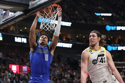 Feb 6, 2023; Salt Lake City, Utah, USA; Dallas Mavericks guard Josh Green (8) dunks the ball against Utah Jazz forward Kelly Olynyk (41) in the second quarter at Vivint Arena. Mandatory Credit: Rob Gray-USA TODAY Sports