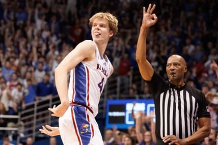Kansas freshman guard Gradey Dick (4) reacts to a three-pointer made agains Texas in the first half of Monday's game against Texas inside Allen Fieldhouse.