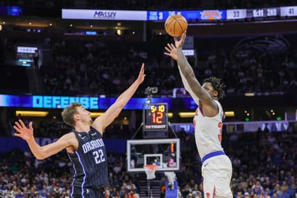 Feb 7, 2023; Orlando, Florida, USA; New York Knicks forward Julius Randle (30) shoots the ball over Orlando Magic forward Franz Wagner (22) during the second quarter at Amway Center. Mandatory Credit: Mike Watters-USA TODAY Sports