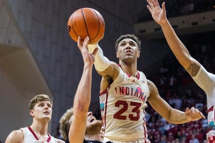 Feb 7, 2023; Bloomington, Indiana, USA; Indiana Hoosiers forward Trayce Jackson-Davis (23) blocks the shot of Rutgers Scarlet Knights guard Cam Spencer (10) in the second half  at Simon Skjodt Assembly Hall. Mandatory Credit: Trevor Ruszkowski-USA TODAY Sports