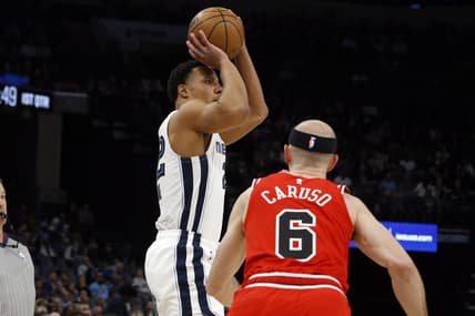 Feb 7, 2023; Memphis, Tennessee, USA; Memphis Grizzlies guard Desmond Bane (22) attempts a three-point shot during the first half against the Chicago Bulls at FedExForum. Mandatory Credit: Petre Thomas-USA TODAY Sports