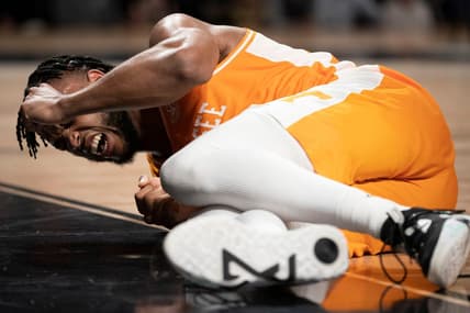 Tennessee guard Josiah-Jordan James (30) cries out after injuring his ankle during the second half of the game against Vanderbilt at Memorial Gymnasium Wednesday, Feb. 8, 2023, in Nashville, Tenn. Vanderbilt defeated Tennessee 66 to 65.

Ncaa Basketball Tennessee At Vanderbilt