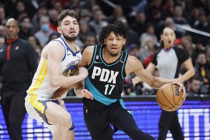 Feb 8, 2023; Portland, Oregon, USA; Portland Trail Blazers shooting guard Shaedon Sharpe (17) drives to the basket against Golden State Warriors shooting guard Ty Jerome (10) during the first half at Moda Center. Mandatory Credit: Soobum Im-USA TODAY Sports