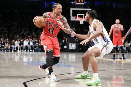 Feb 9, 2023; Brooklyn, New York, USA;  Chicago Bulls forward DeMar DeRozan (11) looks to drive past Brooklyn Nets guard Cam Thomas (24) in the fourth quarter at Barclays Center. Mandatory Credit: Wendell Cruz-USA TODAY Sports