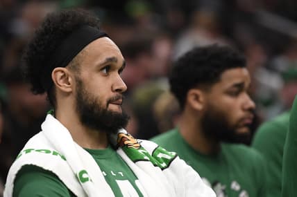 Feb 10, 2023; Boston, Massachusetts, USA;  Boston Celtics guard Derrick White (9) sits on the bench during the second half against the Charlotte Hornets at TD Garden. Mandatory Credit: Bob DeChiara-USA TODAY Sports
