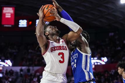 Feb 11, 2023; Athens, Georgia, USA; Georgia Bulldogs guard Kario Oquendo (3) tries to shoot defended by Kentucky Wildcats forward Chris Livingston (24) during the second half at Stegeman Coliseum. Mandatory Credit: Dale Zanine-USA TODAY Sports