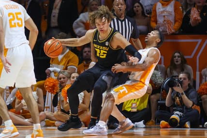 Feb 11, 2023; Knoxville, Tennessee, USA; Missouri Tigers forward Noah Carter (35) and Tennessee Volunteers guard Zakai Zeigler (5) during the first half at Thompson-Boling Arena. Mandatory Credit: Randy Sartin-USA TODAY Sports