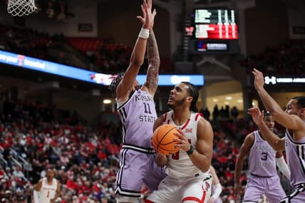 Feb 11, 2023; Lubbock, Texas, USA;  Texas Tech Red Raiders forward Kevin Obanor (0) drives to the basket against Kansas State Wildcats forward Keyontae Johnson (11) in the first half at United Supermarkets Arena. Mandatory Credit: Michael C. Johnson-USA TODAY Sports