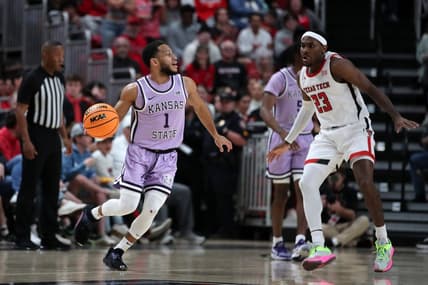 Feb 11, 2023; Lubbock, Texas, USA;  Kansas State Wildcats guard Markquis Nowell (1) dribbles the ball against Texas Tech Red Raiders guard De Vion Harmon (23) in the fist half at United Supermarkets Arena. Mandatory Credit: Michael C. Johnson-USA TODAY Sports