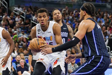 Feb 11, 2023; Orlando, Florida, USA; Miami Heat center Orlando Robinson (25) grabs the rebound during the second quarter against the Orlando Magic at Amway Center. Mandatory Credit: Mike Watters-USA TODAY Sports