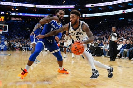 Feb 11, 2023; Philadelphia, Pennsylvania, USA; Villanova Wildcats guard Justin Moore (5) dribbles the ball against Seton Hall Pirates guard Jamir Harris (15) during the second half at Wells Fargo Center. Mandatory Credit: Gregory Fisher-USA TODAY Sports