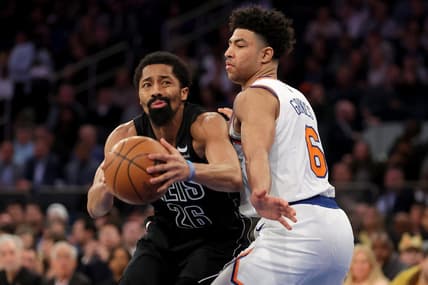 Feb 13, 2023; New York, New York, USA; Brooklyn Nets guard Spencer Dinwiddie (26) is fouled as he shoots by New York Knicks guard Quentin Grimes (6) during the second quarter at Madison Square Garden. Mandatory Credit: Brad Penner-USA TODAY Sports