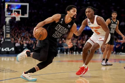 Feb 13, 2023; New York, New York, USA; Brooklyn Nets guard Spencer Dinwiddie (26) drives to the basket against New York Knicks guard Immanuel Quickley (5) during the second quarter at Madison Square Garden. Mandatory Credit: Brad Penner-USA TODAY Sports