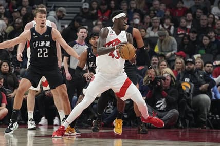 Feb 14, 2023; Toronto, Ontario, CAN;  Toronto Raptors forward Pascal Siakam (43) drives to the net past Orlando Magic forward Franz Wagner (22) during the first half at Scotiabank Arena. Mandatory Credit: John E. Sokolowski-USA TODAY Sports