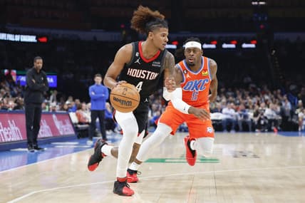 Feb 15, 2023; Oklahoma City, Oklahoma, USA; Houston Rockets guard Jalen Green (4) drives down the court ahead of Oklahoma City Thunder guard Luguentz Dort (5) during the first quarter at Paycom Center. Mandatory Credit: Alonzo Adams-USA TODAY Sports