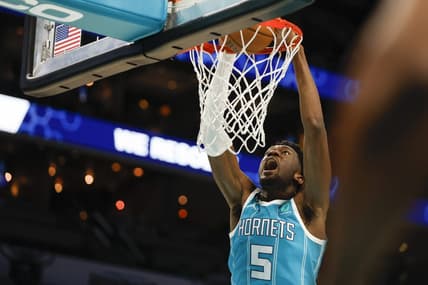 Feb 15, 2023; Charlotte, North Carolina, USA; Charlotte Hornets center Mark Williams (5) dunks against the San Antonio Spurs during the second half at Spectrum Center. The Charlotte Hornets won 120-110. Mandatory Credit: Nell Redmond-USA TODAY Sports