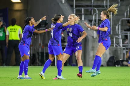 Feb 16, 2023; Orlando, Florida, USA; USA forward Mallory Swanson (9) celebrates with teammates after scoring a goal during the first half against Canada at Exploria Stadium. Mandatory Credit: Mike Watters-USA TODAY Sports