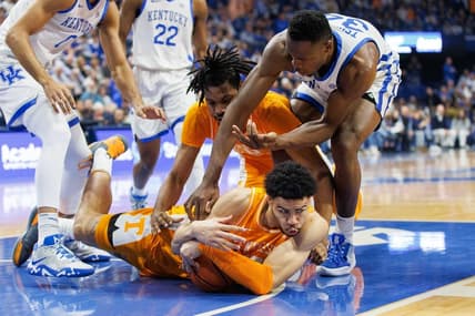 Feb 18, 2023; Lexington, Kentucky, USA; Tennessee Volunteers forward Olivier Nkamhoua (13) goes to the floor with the ball during the first half against the Kentucky Wildcats at Rupp Arena at Central Bank Center. Mandatory Credit: Jordan Prather-USA TODAY Sports