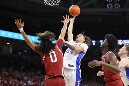 Feb 18, 2023; Fayetteville, Arkansas, USA; Florida Gators guard Riley Kugel (24) shoots over Arkansas Razorbacks guard Anthony Black (0) in the first half at Bud Walton Arena. Mandatory Credit: Nelson Chenault-USA TODAY Sports