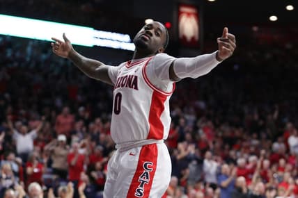 Feb 18, 2023; Tucson, Arizona, USA; Arizona Wildcats guard Courtney Ramey (0) celebrates after a three point basket during the first half at McKale Center. Mandatory Credit: Zachary BonDurant-USA TODAY Sports