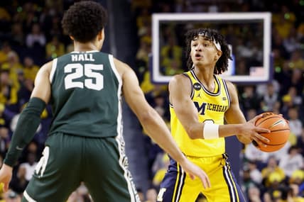 Feb 18, 2023; Ann Arbor, Michigan, USA;  Michigan Wolverines guard Kobe Bufkin (2) controls the ball against Michigan State Spartans forward Malik Hall (25) in the first half at Crisler Center. Mandatory Credit: Rick Osentoski-USA TODAY Sports