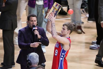Feb 18, 2023; Salt Lake City, UT, USA; Philadelphia 76ers guard Mac McClung (9) reacts after winning the Dunk Contest during the 2023 All Star Saturday Night at Vivint Arena. Mandatory Credit: Kirby Lee-USA TODAY Sports