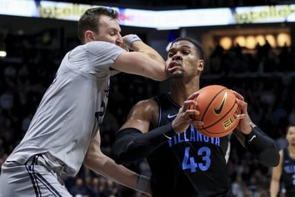 Feb 21, 2023; Cincinnati, Ohio, USA;  Xavier Musketeers forward Jack Nunge (24) defends against Villanova Wildcats forward Eric Dixon (43) in the second half at the Cintas Center. Mandatory Credit: Aaron Doster-USA TODAY Sports