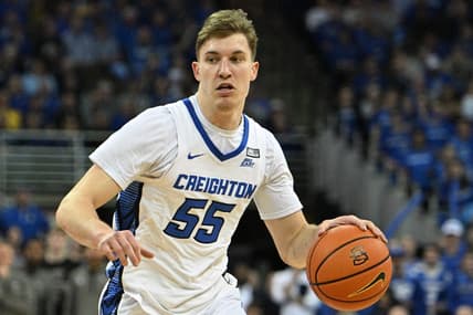 Feb 21, 2023; Omaha, Nebraska, USA;  Creighton Bluejays guard Baylor Scheierman (55) dribbles against the Marquette Golden Eagles in the second half at CHI Health Center Omaha. Mandatory Credit: Steven Branscombe-USA TODAY Sports
