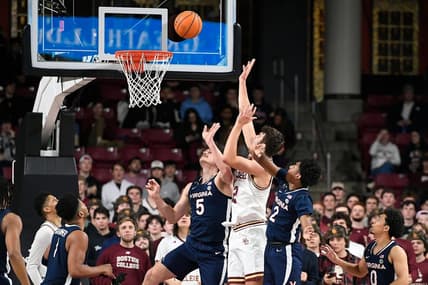 Feb 22, 2023; Chestnut Hill, Massachusetts, USA; Boston College Eagles forward Quinten Post (12) shoots against the Virginia Cavaliers during the first half at Conte Forum. Mandatory Credit: Eric Canha-USA TODAY Sports