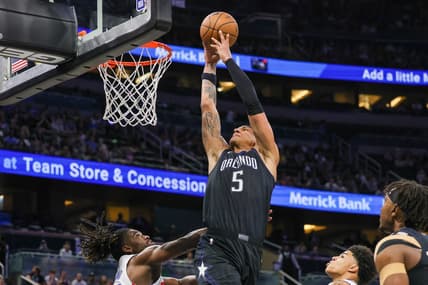 Feb 23, 2023; Orlando, Florida, USA; Orlando Magic forward Paolo Banchero (5) goes to the basket during the first quarter against the Detroit Pistons at Amway Center. Mandatory Credit: Mike Watters-USA TODAY Sports