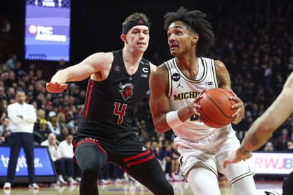 Feb 23, 2023; Piscataway, New Jersey, USA; Michigan Wolverines guard Kobe Bufkin (2) drives to the basket against Rutgers Scarlet Knights guard Paul Mulcahy (4) during the first half at Jersey Mike's Arena. Mandatory Credit: Vincent Carchietta-USA TODAY Sports