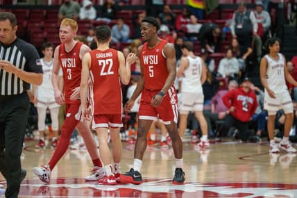 Feb 23, 2023; Stanford, California, USA;  Washington State Cougars guard Dylan Darling (22) and Washington State Cougars guard Jabe Mullins (3) and Washington State Cougars guard TJ Bamba (5) celebrate after the game against the Stanford Cardinal during the second half at Maples Pavilion. Mandatory Credit: Neville E. Guard-USA TODAY Sports