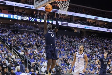 Feb 24, 2023; Newark, New Jersey, USA; Xavier Musketeers guard Souley Boum (0) shoots the ball in front of Seton Hall Pirates forward Tray Jackson (1) during the first half at Prudential Center. Mandatory Credit: Vincent Carchietta-USA TODAY Sports