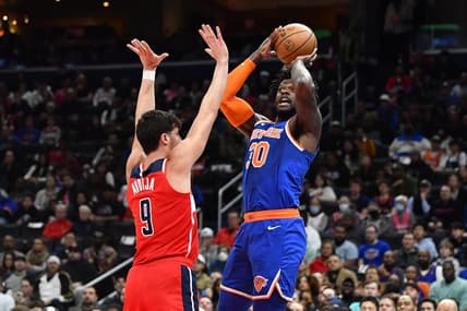 Feb 24, 2023; Washington, District of Columbia, USA; New York Knicks forward Julius Randle (30) shoots over Washington Wizards forward Deni Avdija (9) during the first half at Capital One Arena. Mandatory Credit: Brad Mills-USA TODAY Sports