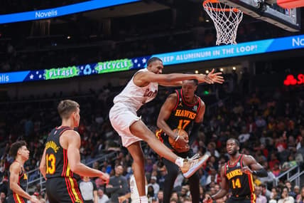 Feb 24, 2023; Atlanta, Georgia, USA; Cleveland Cavaliers forward Evan Mobley (4) and Atlanta Hawks forward Onyeka Okongwu (17) reach for a rebound in the second quarter at State Farm Arena. Mandatory Credit: Brett Davis-USA TODAY Sports
