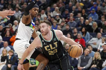 Feb 24, 2023; Minneapolis, Minnesota, USA; Charlotte Hornets forward Gordon Hayward (20) works around Minnesota Timberwolves forward Jaden McDaniels (3) in the first quarter at Target Center. Mandatory Credit: Bruce Kluckhohn-USA TODAY Sports