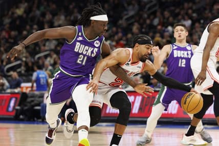 Feb 24, 2023; Milwaukee, Wisconsin, USA;  Miami Heat guard Gabe Vincent (2) drives for the basket against Milwaukee Bucks guard Jrue Holiday (21) during the third quarter at Fiserv Forum. Mandatory Credit: Jeff Hanisch-USA TODAY Sports